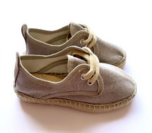 Olivia Ann Unisex Canvas and Jute sneakers. Getting a summer twist with hand stitched "beachy" rope detailing! Typical form of  Spanish summer wear.