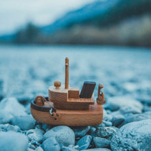 Cutest tugboat ever! The details are just amazing! This is not just a simple ship,it's a Tugboat, hours of fun!  We love that these beautifully designed and made toys are not only toys but make the most beautiful decor for kids’ rooms too!