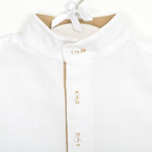 White shirt with elbow patches