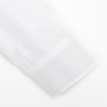 White shirt with elbow patches