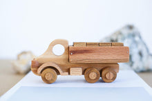 Wooden Car Transporter Toy  with which it is possible to play different role games. The limit is your imagination!  Sustainable and Ethical piece, handmade and designed to stand the test of time, making it the most perfect heirloom toy to pass on to many generations.