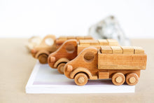Wooden Car Transporter Toy  with which it is possible to play different role games. The limit is your imagination!  Sustainable and Ethical piece, handmade and designed to stand the test of time, making it the most perfect heirloom toy to pass on to many generations.