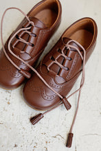 Beautiful smart-casual style lace-up brogue shoes. Made in an classic tan leather with contrast cream laces and a lovely tassel detail. Olivia Ann Shoes