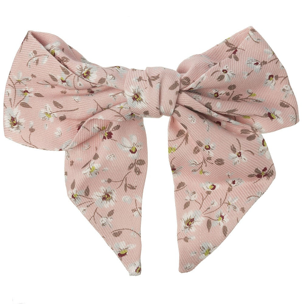 Beautiful hair bow in a delicate pale pink floral pattern, a unique handmade piece! snap hair clip. This bow adds a perfect touch to any outfit!
