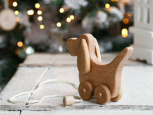 A walk-a long toy is the best toy for those who have already learned to walk. Is comfortable to hold by the smooth wooden handle. The ears are spinning. This sweet beagle is made of solid beech. Montessori educational toy,