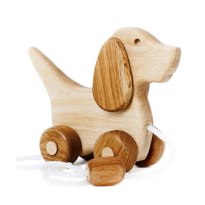 A walk-a long toy is the best toy for those who have already learned to walk. Is comfortable to hold by the smooth wooden handle. The ears are spinning. This sweet beagle is made of solid beech. Montessori educational toy,