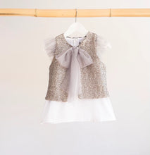 Stunning Sequins Vest! High Quality Silver sequins for a special occasion. Featuring tulle bow to tie at the front. Will add a pop for any outfit!