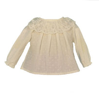 Delicate and feminine Plumeti Blouse, a thin cotton fabric voile type with embroidered polka dots.