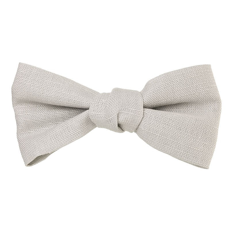 Beautiful and classic Linen bow in an alligator hair clip. This bow adds a perfect touch to any outfit! Timeless design a must have! Handmade in Spain . Olivia Ann Wholesale Accessories.