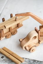 Logging truck - It's great when a toy can interact with surrounding objects. In the trailer of this truck you can transport different things, in this case wooden logs. Wooden toys. Building toys.Heirloom toys.