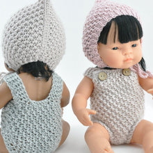 This cosy, textured knitted romper is hand knitted in Europe, specially designed for the 32 cm dolls, but can fit dolls around 30-34cm (11 - 13 inch) Miniland, Minikane, Paola Reina Gordis etc.