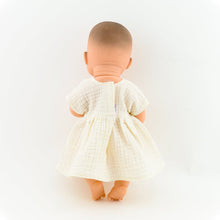 Make your little one's day with this divine doll's ecru muslin dress today. Our dolls clothing is super adorable and of amazing quality, will absolutely melt your heart. Doll dress miniland, minikane, paola reina clothes. Olivia Ann doll clothes