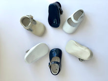 Adorable Olivia Ann Mary Jane Baby Shoes with soft sole they are a classic and oh so adorable pram shoe. Adjustable buckle strap for the perfect fitting.  With a delicate scalloped edged. Olivia Ann Shoes.