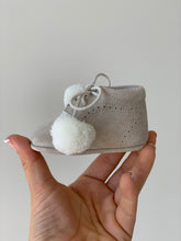 Adorable Olivia Ann Baby Pom-Poms Boots with soft sole they are a classic and oh so adorable pram shoe.   With sweet Pom-Pom laces in a super soft suede leather