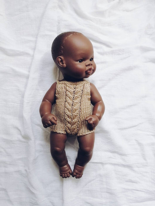 Adorable hand knitted summer romper for dolls in caramel colour with cable pattern at the chest. They will make your children's doll look oh so adorable!  It will fit dolls from 32 up to 38 cm like Miniland, Minikane ,Paola Reina or similar.  