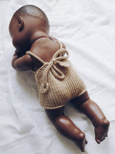 Adorable hand knitted summer romper for dolls in caramel colour with cable pattern at the chest. They will make your children's doll look oh so adorable!  It will fit dolls from 32 up to 38 cm like Miniland, Minikane ,Paola Reina or similar.  