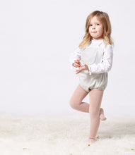 Adorable light grey romper for babies and little girls with pockets at front. Made with the softest cotton. 