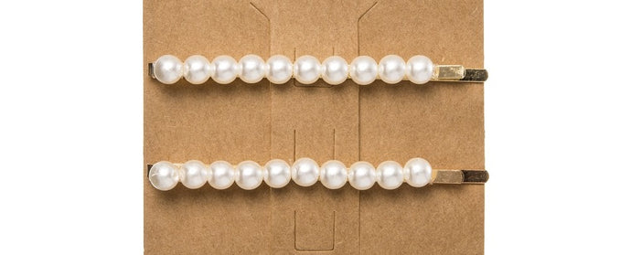 Pack of 2 Hairpins. This trending Pearl Hairpin is the perfect accessory to elevate any outfit!  Made from a golden hairpin