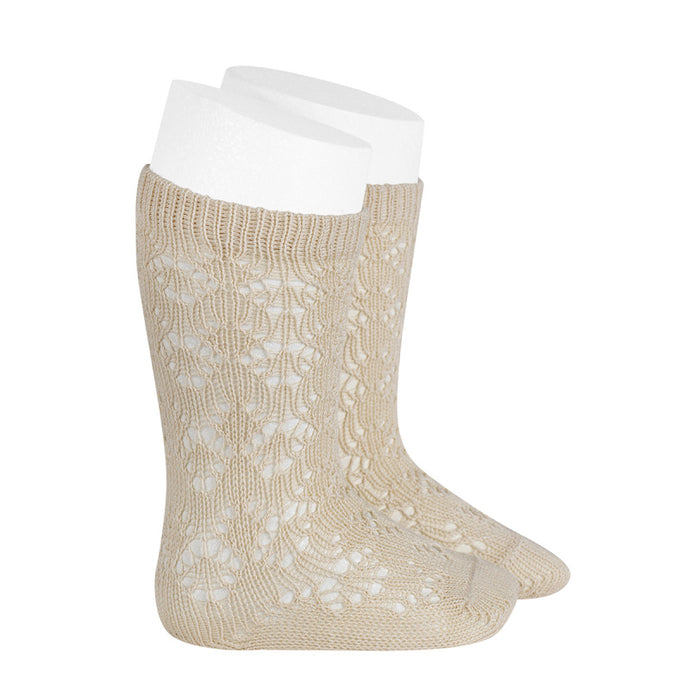 A very special  pair of socks, featuring an exquisite openwork geometric design in a delicate linen colour.  Very good quality socks. Ideal for Spring and Autumn weather. It will add a beautiful touch to any outfit! Soooo sweet. Condor socks stockings