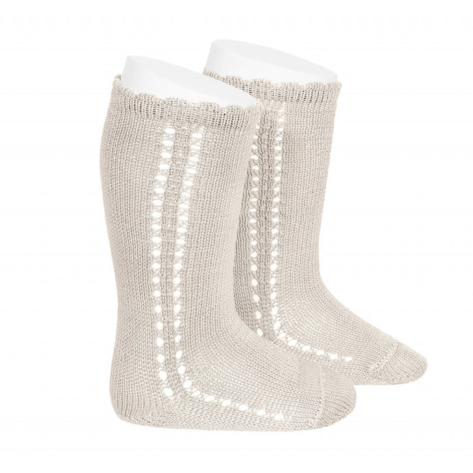 The most adorable Cotton side Operwork Knee high Socks. Super soft and the details are just stunning! Your little one will love them. Linen. COndor