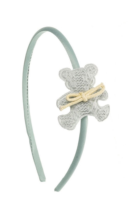 Cutest and unique Teddy Bear hairband. Teddy Bear measures approximately 4 x 4 cm and the hairband 0.5 cm thick. The hairband is handmade with a beautiful and soft grey silk fabric. Wholesale Olivia Ann Accessories