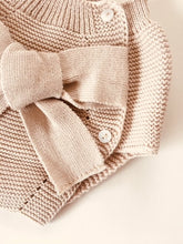 Adorable baby bloomers with a big bow, knitted in beige colour with 100% of the softest cotton.