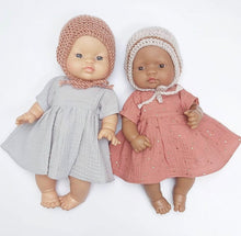 This cosy bonnet is hand knitted in Europe, specially designed for the 32 cm dolls, can fit dolls around 30 - 34 cm (11- 13 inch) Miniland, Minikane, Paola Reina Gordis and similar.