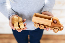 Wooden Car Transporter Toy  with which it is possible to play different role games. The limit is your imagination!  Sustainable and Ethical piece, handmade and designed to stand the test of time, making it the most perfect heirloom toy to pass on to many generations.