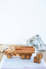 Wooden Car Transporter Toy  with which it is possible to play different role games. The limit is your imagination!  Sustainable and Ethical piece, handmade and designed to stand the test of time, making it the most perfect heirloom toy to pass on to many generations.